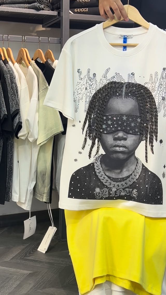 Graphic tee on a hanger in the shop